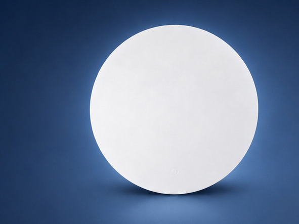 Araknis 320 indoor access point on the matching blue studio background