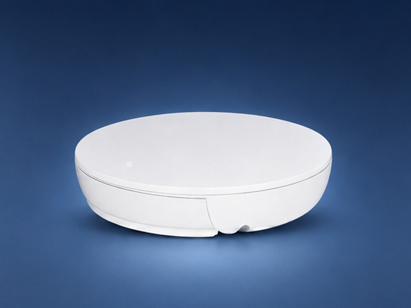 Araknis 520 indoor access point on the matching blue studio background