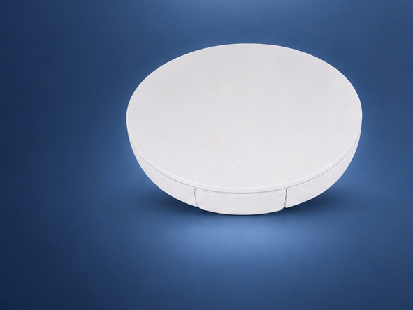 Araknis 530 Wi-Fi 7 indoor access point on the matching blue studio background