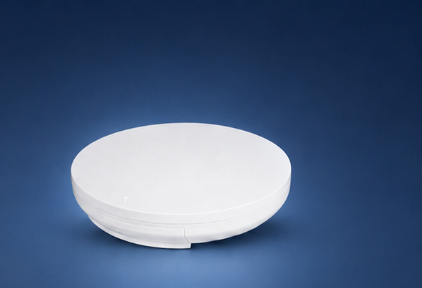 Araknis 820 indoor access point on the matching blue studio background