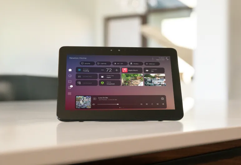 Control4 touchscreen showing lighting, temperature, shades, security, cameras and music