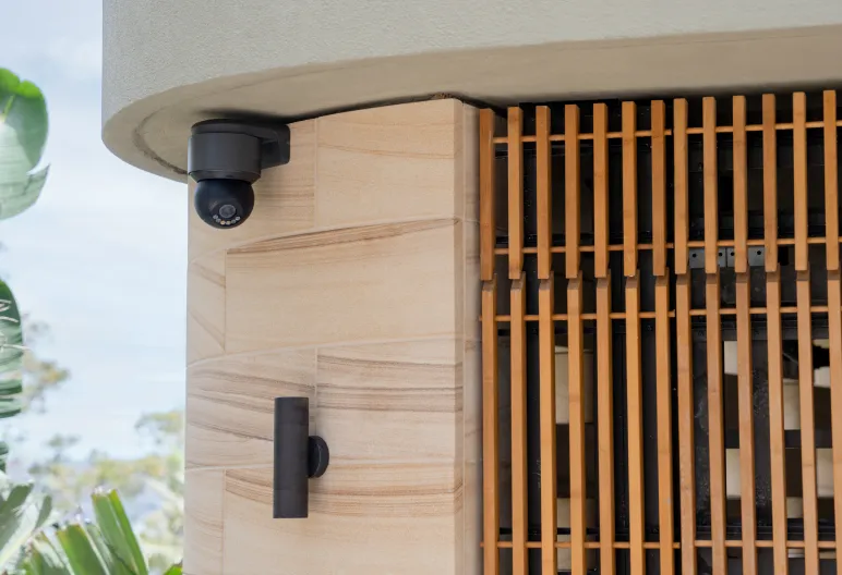 Entrance camera and architectural door hardware at a modern home