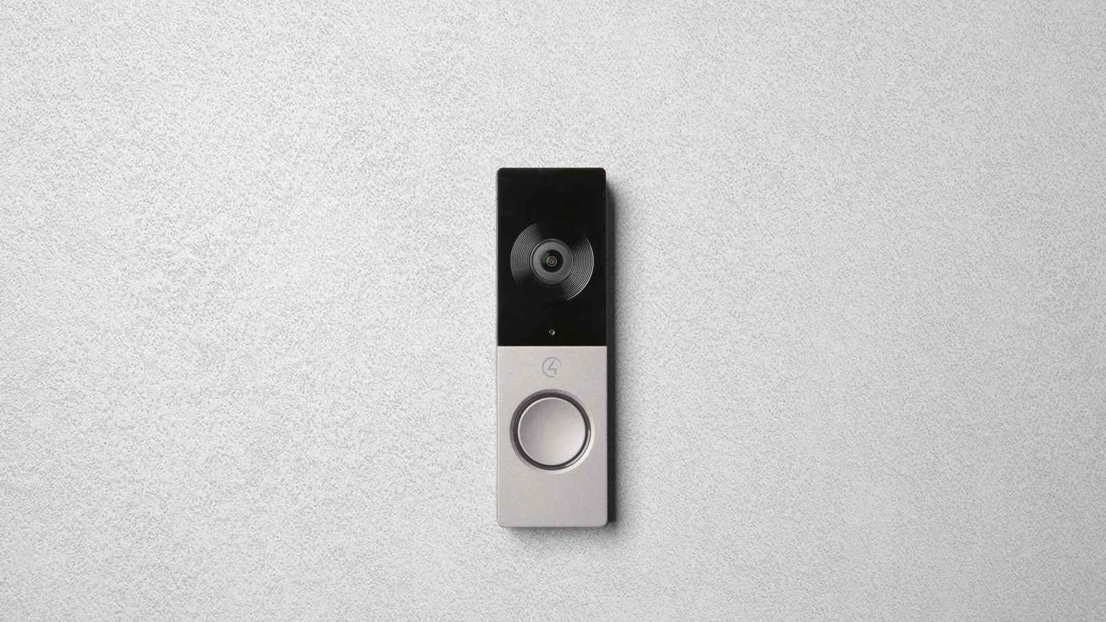 Control4 Chime PoE video doorbell mounted on a stucco exterior wall