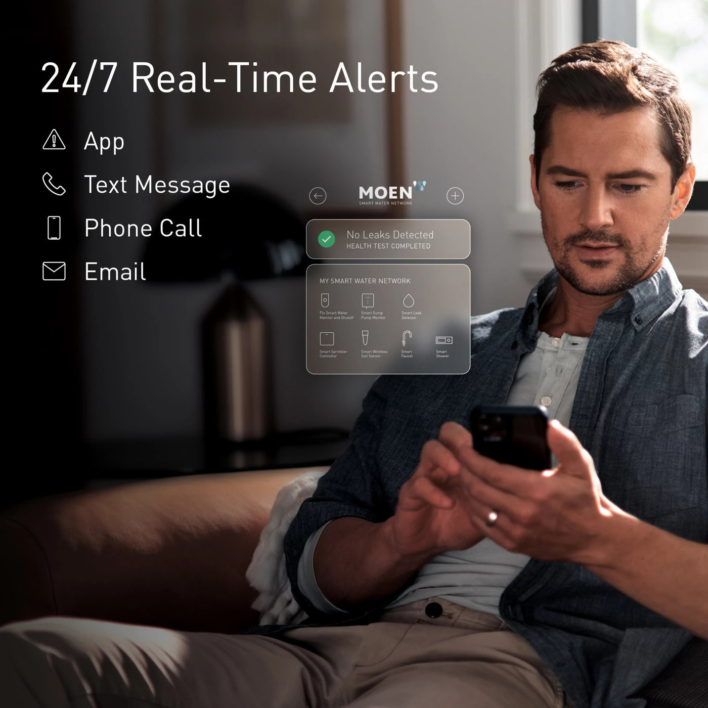 Homeowner receiving real-time water-system alerts on a phone