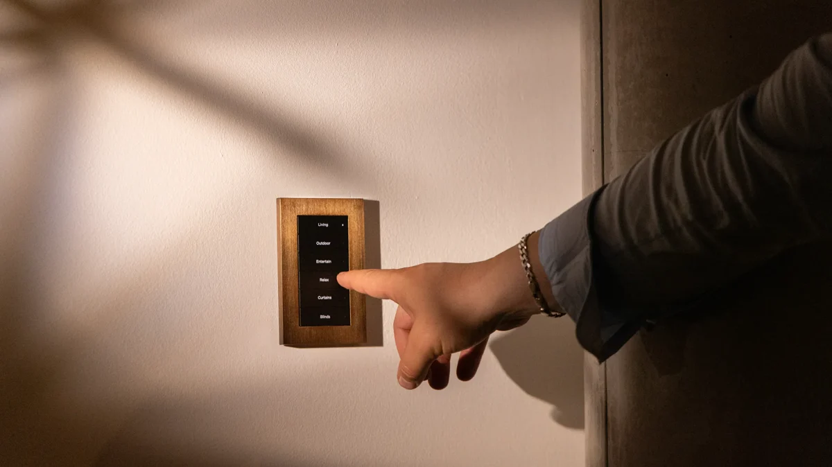 Bronze Lux by Control4 keypad being used on the wall