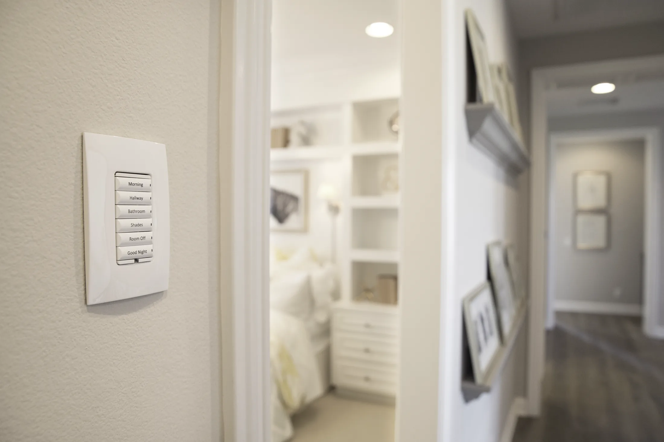 Engraved Control4 scene keypad installed in a hallway