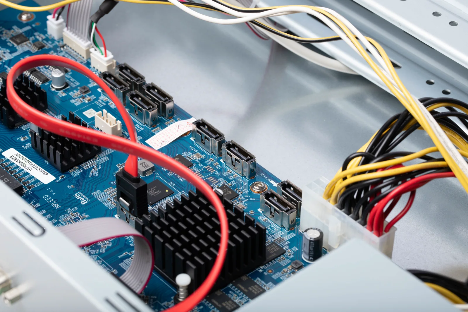 Internal Luma NVR board and hard-drive connections