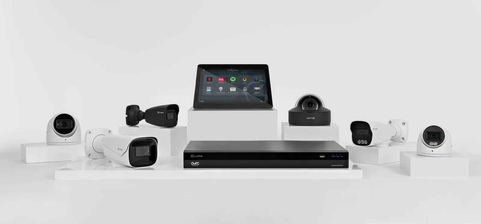 Luma cameras, network video recorder and smart-home touchscreen shown as a complete surveillance system