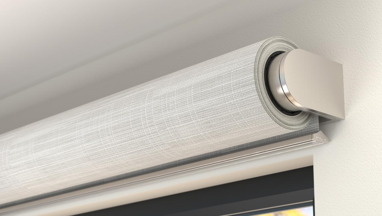 Wire-free motorized roller shade with an exposed architectural bracket