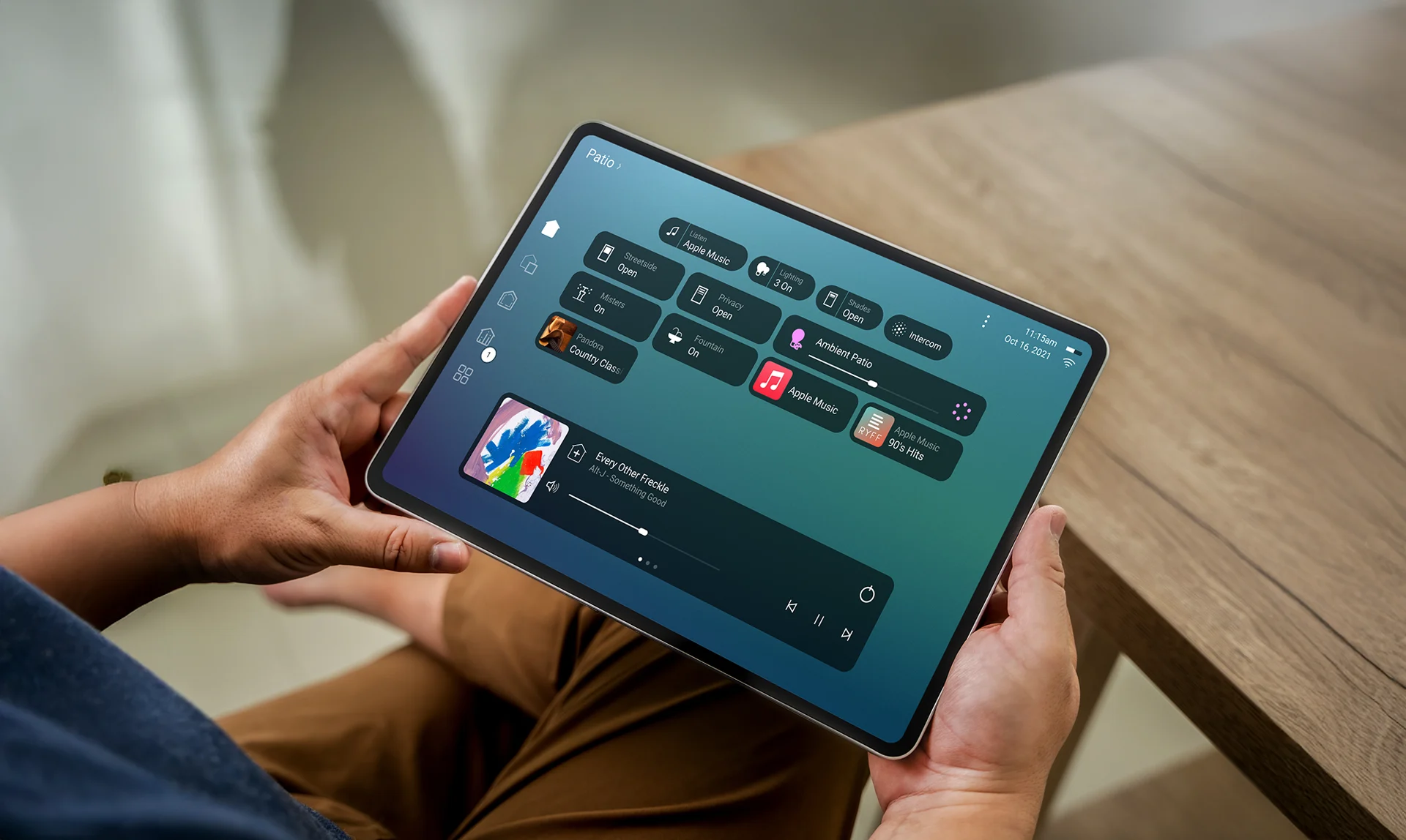 Homeowner using a smart-home dashboard for the Smart Home Buyer's Guide