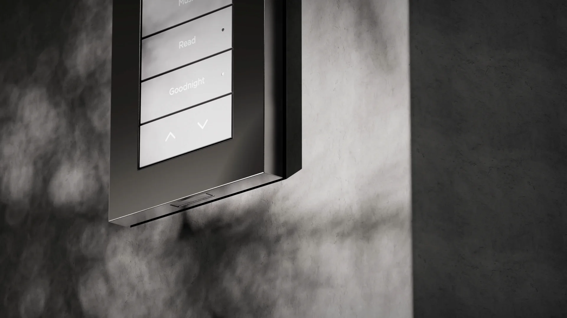 Close view of an engraved black Lux by Control4 keypad