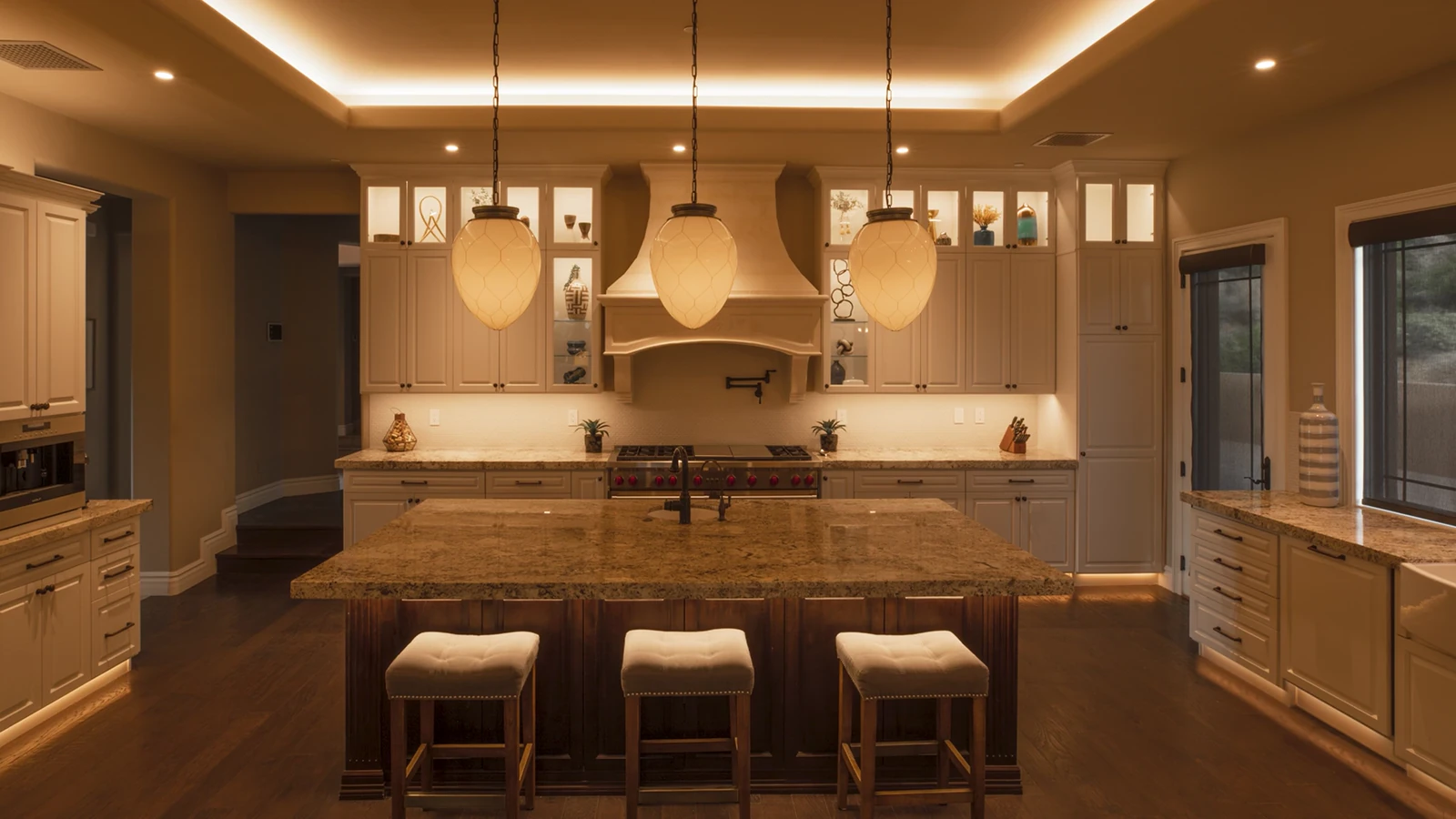 Layered Vibrant linear lighting in a luxury kitchen