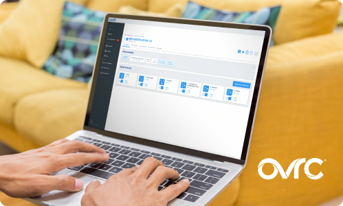 Technician using OvrC remote monitoring on a laptop