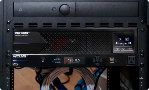 WattBox 900 power conditioner installed with an OvrC UPS in a rack