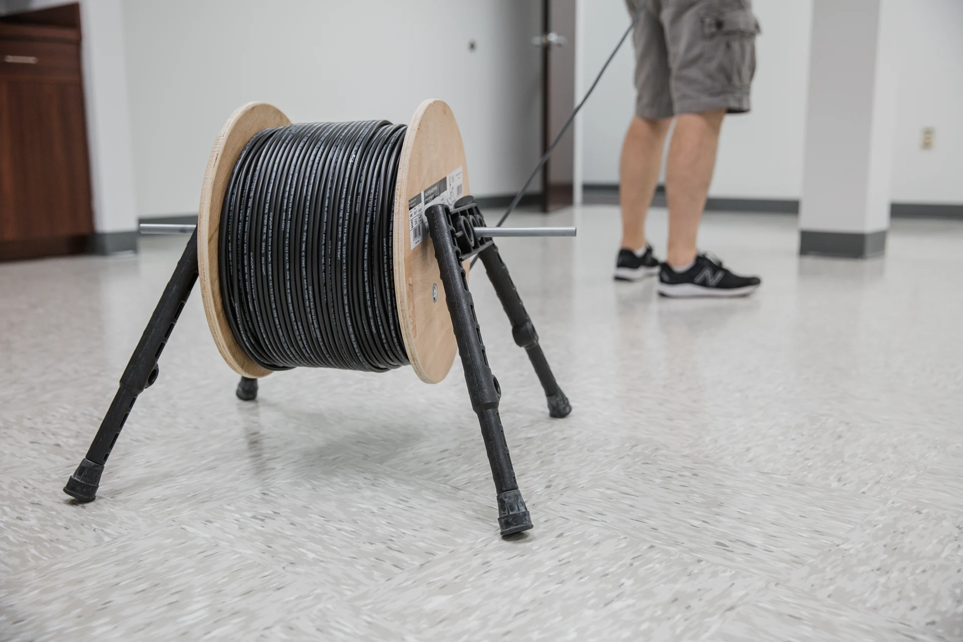 Wirepath low-voltage cable being pulled during a professional prewire installation